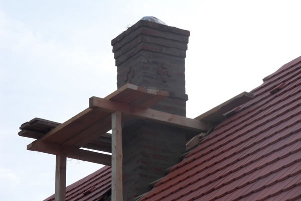 Comment nettoyer et réparer une cheminée en brique